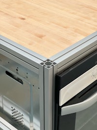 a kitchen with an oven and a microwave